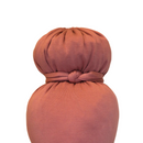 Easily create the iconic crown bun on the Afrona with the crown tie