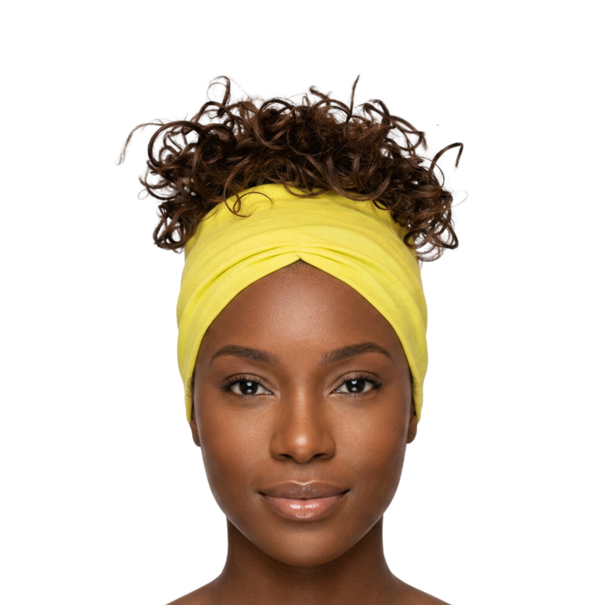 Woman wearing a yellow headband on a white background