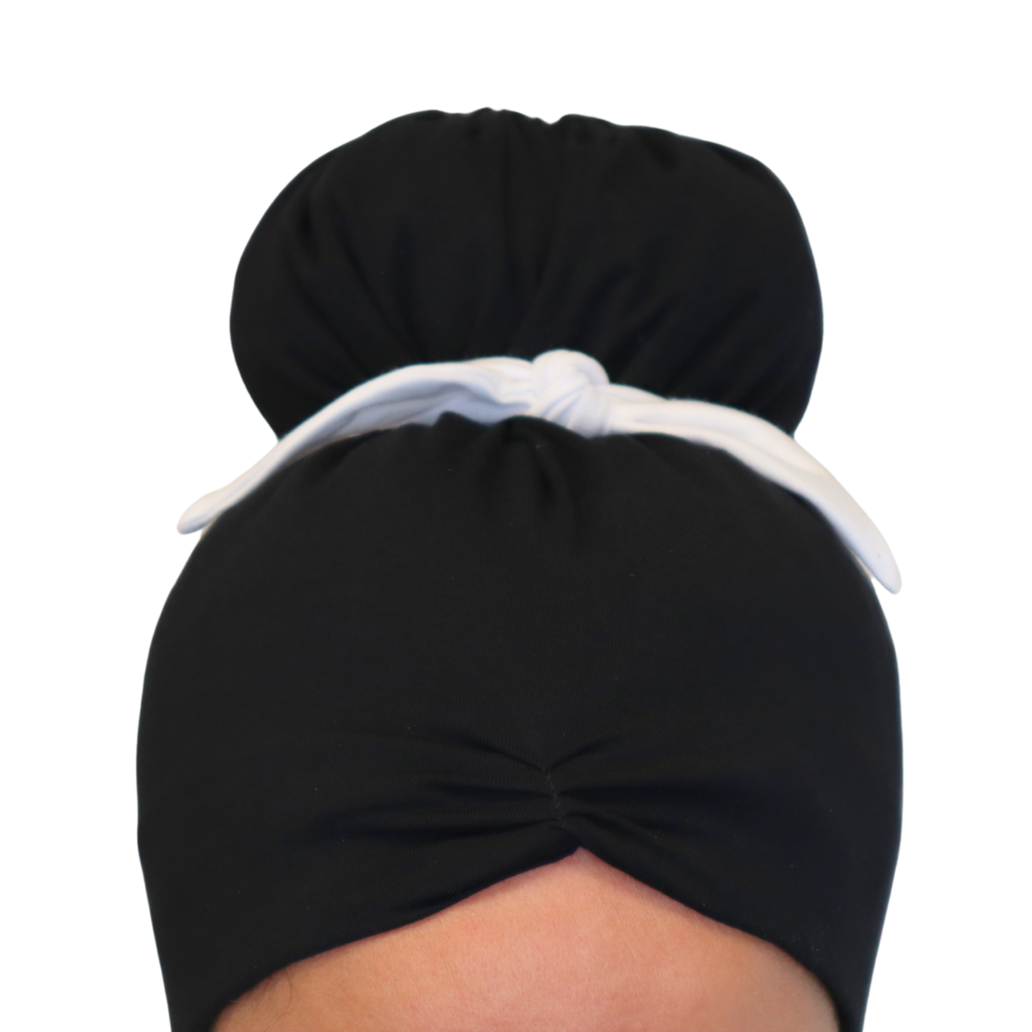 Easily create the iconic crown bun on the afrona with the crown tie