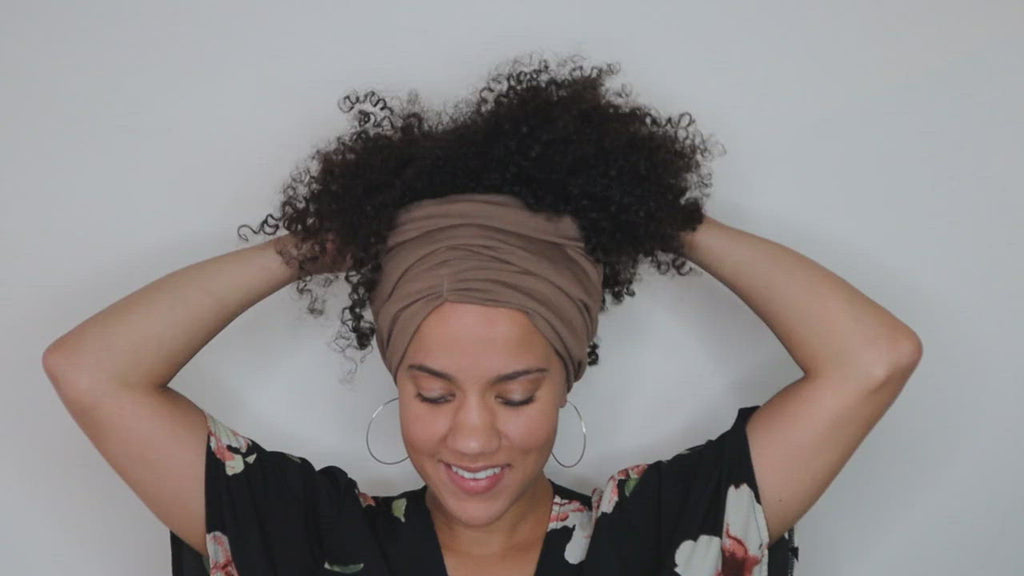 Stand Your Crown - Video of the Afrona being used with the Crown bun style. 
